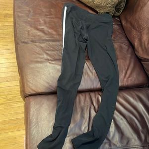 Black leggings with white stripes